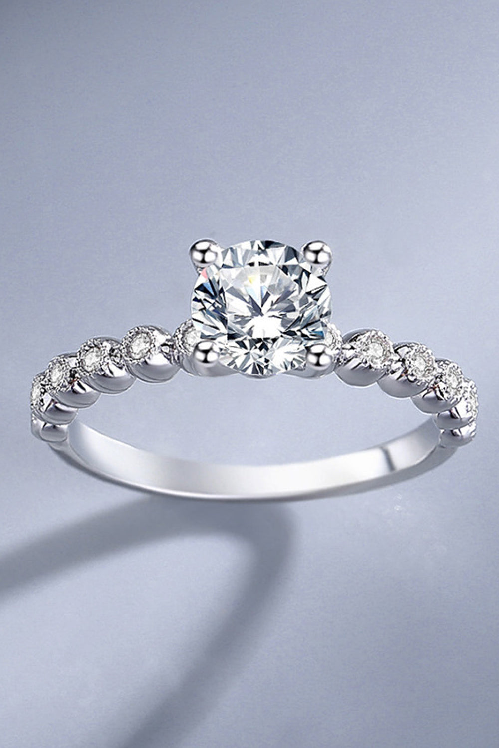 Classic 4-Prong Brilliant Round Cut Sparkala™ Moissanite Ring