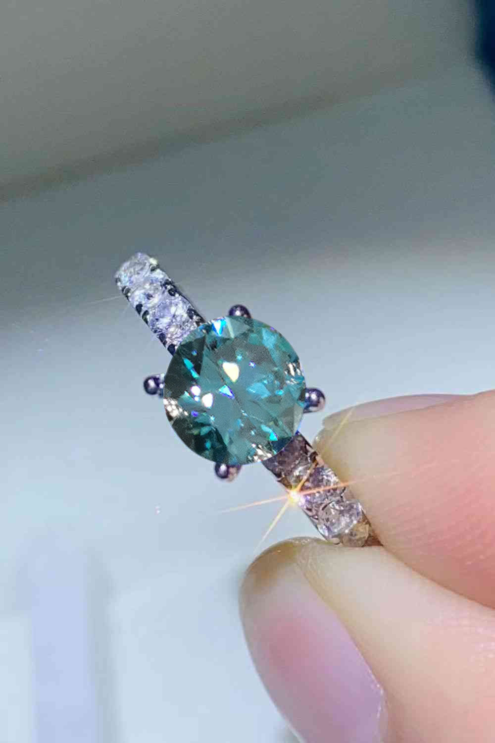 Future Style 1 Carat Blue Round Brilliant Cut Moissanite Side Stone Ring - Sparkala