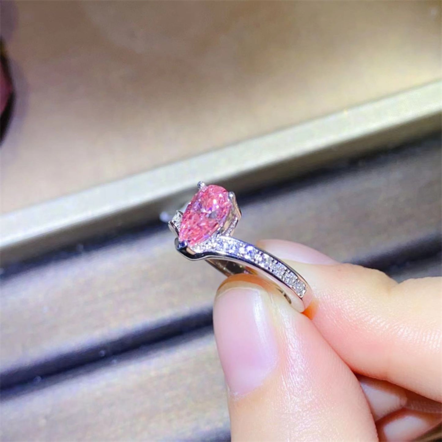 1 Carat Pear-Cut Pink Moissanite Platinum Over Pure Sterling Silver Ring - Sparkala
