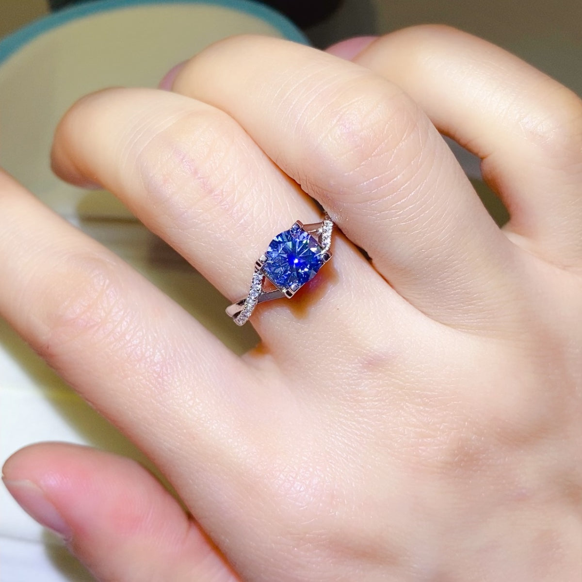 1 Carat Blue Round Brilliant Cut Moissanite Crisscross Pure Sterling Silver Ring - Sparkala