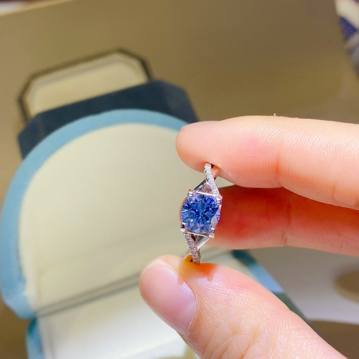 1 Carat Blue Round Brilliant Cut Moissanite Crisscross Pure Sterling Silver Ring - Sparkala