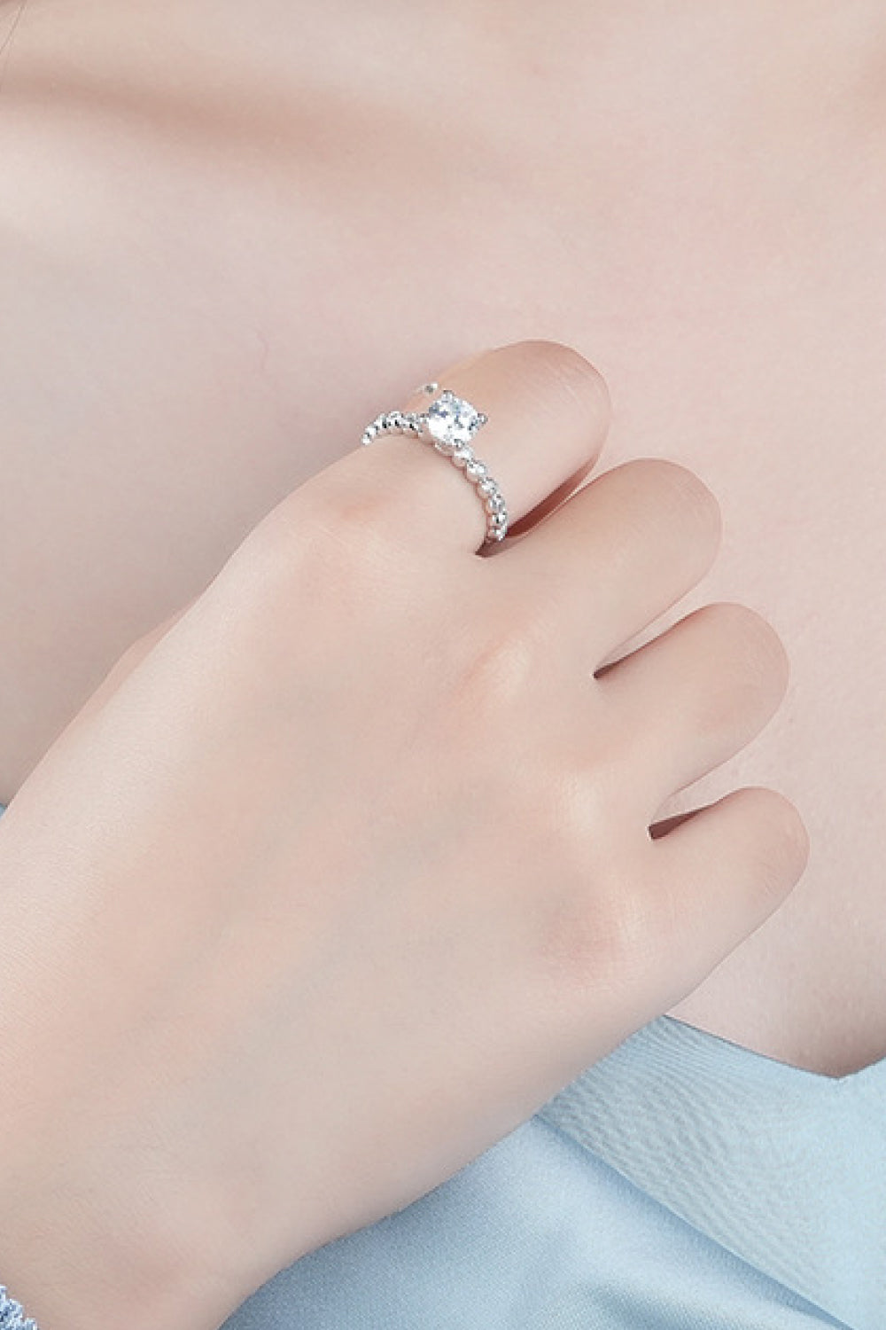 Classic 4-Prong Brilliant Round Cut Sparkala™ Moissanite Ring
