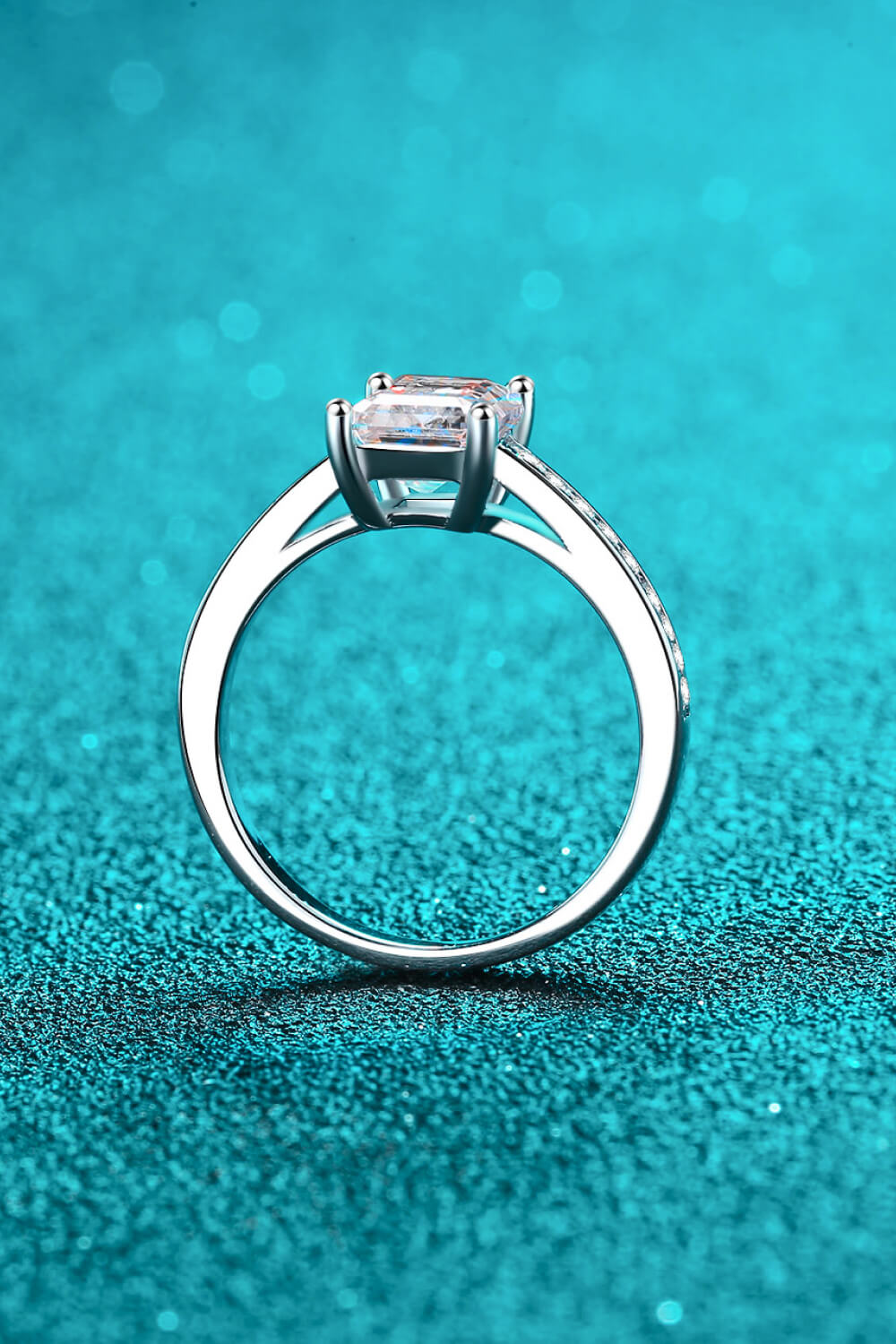 Rhodium Over Pure Sterling Silver Side Stone Emerald-Cut Moissanite Ring