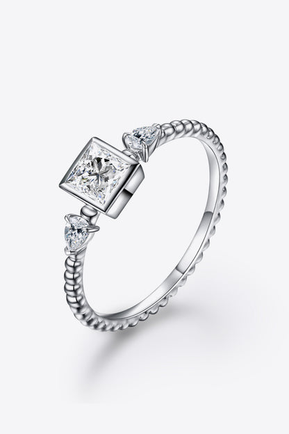 Sparkala™ Moissanite Round in Square Shaped Platinum Over Pure Sterling Silver Ring